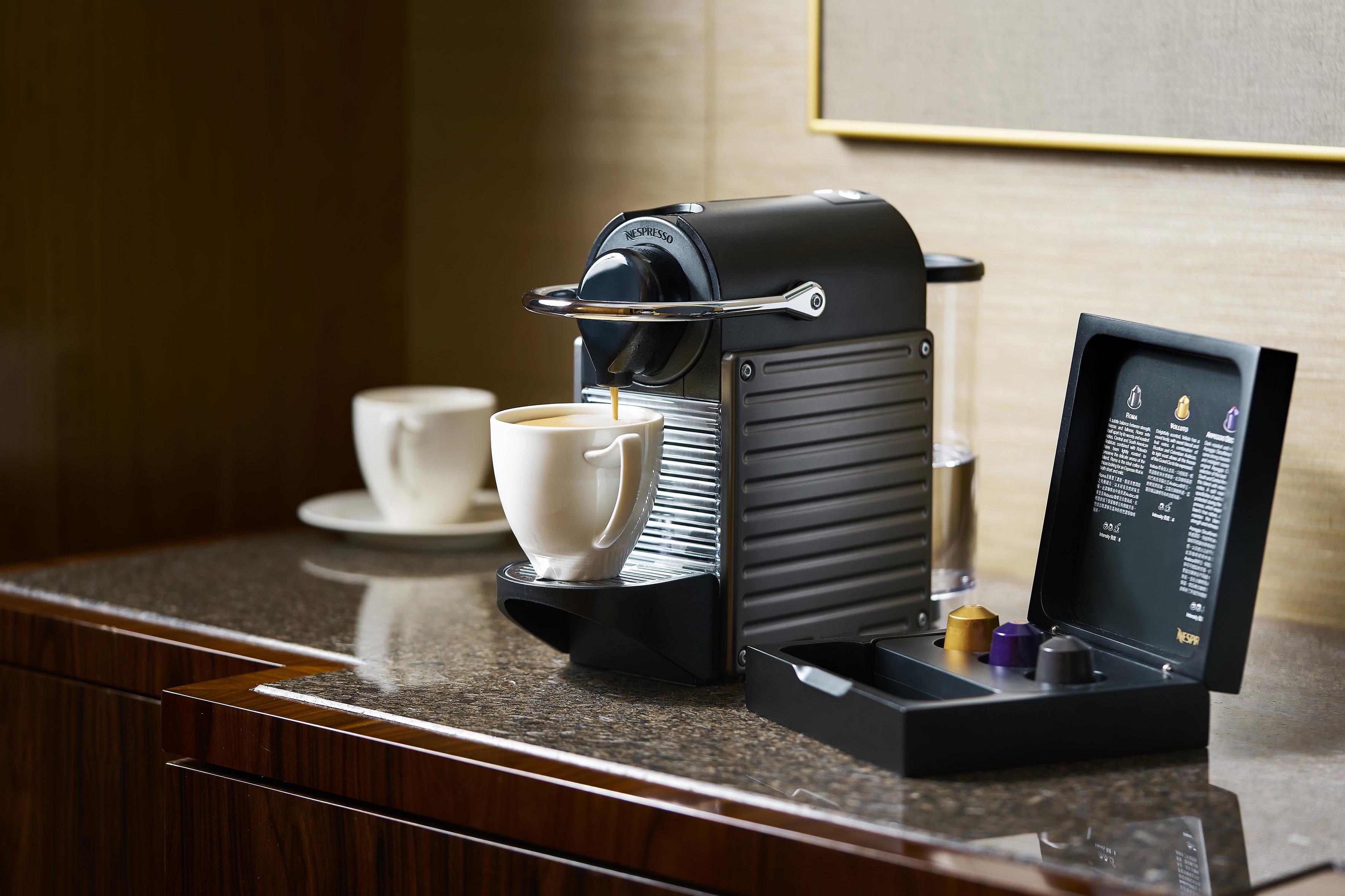 The Royal Garden Hotel Хонконг Екстериор снимка A Nespresso machine